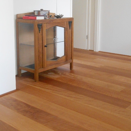 Living room with natural brown wood floors